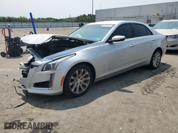 2014 Cadillac CTS Luxury AWD with VIN 1G6AX5SX5E0129143, listed as a Copart auction lot 58914015 with 131,465 mi miles and Salvage title. Bid and sale history available at DreamBid. Image 1.