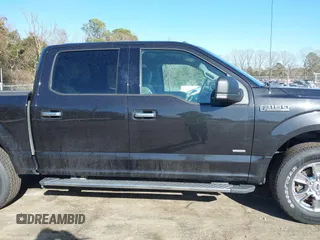 2015 Ford F-150 XLT with VIN 1FTEW1EG6FKF22211, listed as a IAAI auction lot 41753438 with 130,019 mi miles. Bid and sale history available at carsss.com. Image 13.