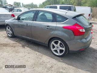 2014 Ford Focus Titanium with VIN 1FADP3N20EL422693, listed as a IAAI auction lot 42060024 with 97,371 mi miles and . Bid and sale history available at DreamBid. Image 3.