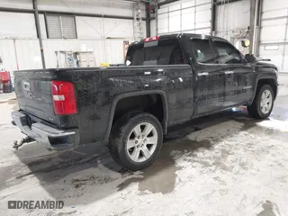 2015 GMC Sierra 1500 SLE with VIN 1GTV2UEC8FZ305535, listed as a IAAI auction lot 41646688 with 103,841 mi miles. Bid and sale history available at carsss.com. Image 4.