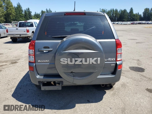 2008 Suzuki Grand Vitara w/Spare & Cargo Covers with VIN JS3TD941384103086, listed as a Copart auction lot 66416545 with 158,602 mi miles and Clean title. Bid and sale history available at DreamBid. Image 6.