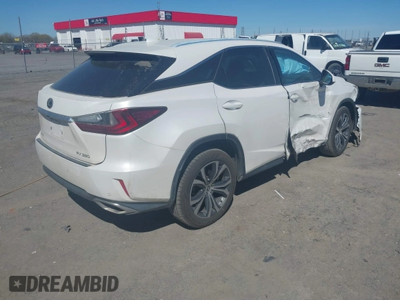 2018 Lexus RX 350 z VIN 2T2BZMCAXJC144930, wystawiony jako IAAI lot #41857778 z przebiegiem 108 191 mil mil oraz . Historia ofert i sprzedaży dostępna na DreamBid. Obrazek 4.