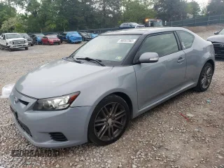 2013 Scion tC z VIN JTKJF5C78D3045094, wystawiony jako Copart lot #56052365 z przebiegiem 165 760 mil mil oraz Szkody całkowita. Historia ofert i sprzedaży dostępna na DreamBid. Obrazek 1.