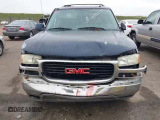2006 GMC Yukon XL SLT with VIN 1GKEC16Z56J140299, listed as a IAAI auction lot 41593951 with 219,924 mi miles. Bid and sale history available at carsss.com. Image 6.
