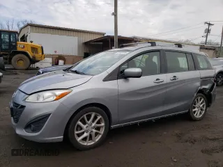 2012 Mazda 5 Touring with VIN JM1CW2CL5C0123228, listed as a Copart auction lot 52982225 with 134,255 mi miles and Salvage Title. Bid and sale history available at DreamBid. Image 1.