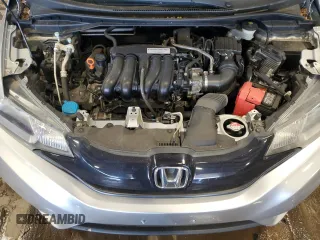 2016 Honda Fit LX z VIN JHMGK5H50GX026653, wystawiony jako Copart lot #57766675 z przebiegiem 68 656 mil mil oraz Szkody całkowita. Historia ofert i sprzedaży dostępna na DreamBid. Obrazek 11.