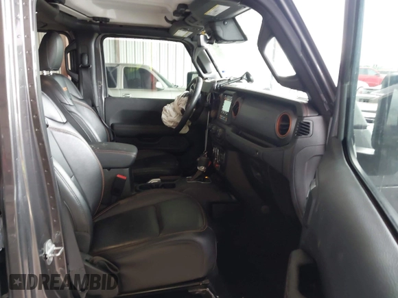 2022 Jeep Gladiator Mojave z VIN 1C6JJTEG8NL182360, wystawiony jako IAAI lot #42194516 z przebiegiem 67 658 mil mil oraz . Historia ofert i sprzedaży dostępna na DreamBid. Obrazek 5.