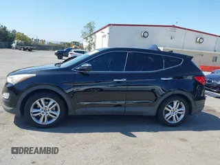 2013 Hyundai Santa Fe Sport z VIN 5XYZW3LA8DG037065, wystawiony jako IAAI lot #42139488 z przebiegiem 165 794 mil mil oraz . Historia ofert i sprzedaży dostępna na DreamBid. Obrazek 14.