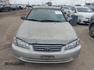 2000 Toyota Camry CE z VIN JT2BG22K9Y0458526, wystawiony jako IAAI lot #42289402 z przebiegiem 269 596 mil mil oraz . Historia ofert i sprzedaży dostępna na DreamBid. Obrazek 6.