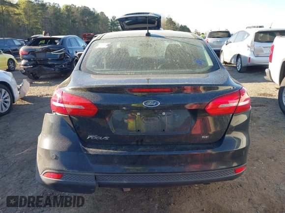 2015 Ford Focus SE with VIN 1FADP3F29FL210973, listed as a IAAI auction lot 41874367 with 128,705 mi miles. Bid and sale history available at carsss.com. Image 16.