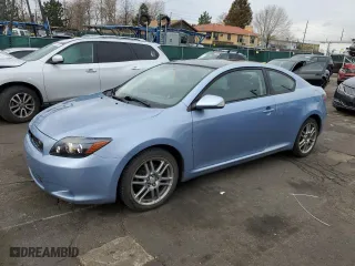 2009 Scion tC with VIN JTKDE167790288831, listed as a Copart auction lot 51474585 with 106,338 mi miles and Salvage Title. Bid and sale history available at carsss.com. Image 1.