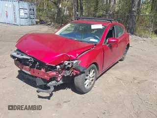 2015 Mazda 3 i Grand Touring z VIN JM1BM1M75F1269995, wystawiony jako IAAI lot #42140185 z przebiegiem 71 973 mil mil oraz . Historia ofert i sprzedaży dostępna na DreamBid. Obrazek 2.
