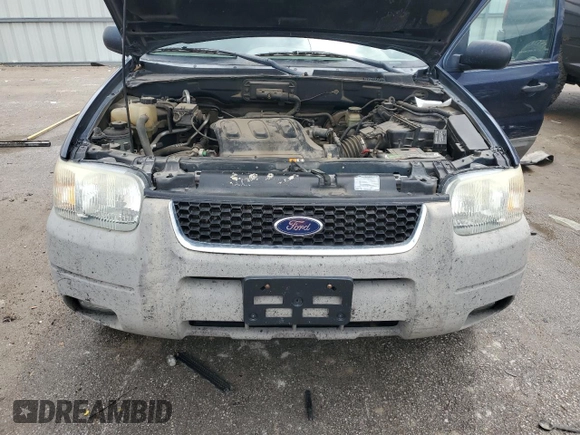 2002 Ford Escape XLT Choice with VIN 1FMYU04192KD87001, listed as a Copart auction lot 57860475 with 195,323 mi miles and Salvage title. Bid and sale history available at DreamBid. Image 12.