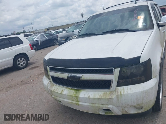 2009 Chevrolet Tahoe 2LT z VIN 1GNFC23059R156494, wystawiony jako IAAI lot #42423722 z przebiegiem Nie podano mil oraz . Historia ofert i sprzedaży dostępna na DreamBid. Obrazek 10.
