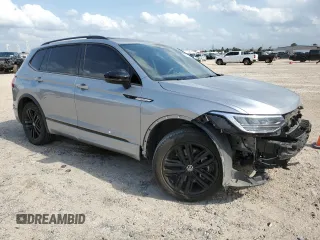 2022 Volkswagen Tiguan SE R-Line Black with VIN 3VVCB7AX6NM140264, listed as a Copart auction lot 55124815 with 28,340 mi miles and Salvage title. Bid and sale history available at DreamBid. Image 4.
