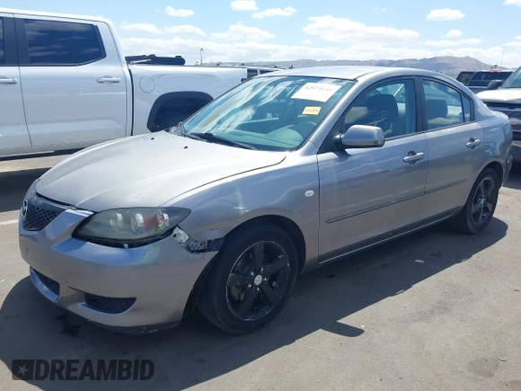 2006 Mazda Mazda3 i with VIN JM1BK12G161465537, listed as a IAAI auction lot 42074144 with 167,823 mi miles. Bid and sale history available at carsss.com. Image 6.