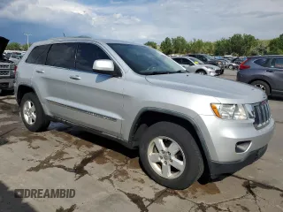 2011 Jeep Grand Cherokee Laredo with VIN 1J4RR4GG1BC576277, listed as a Copart auction lot 63220925 with 149,573 mi miles and Salvage title. Bid and sale history available at DreamBid. Image 4.
