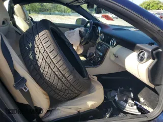 2015 Mercedes-Benz SLK 250 z VIN WDDPK4HA6FF104744, wystawiony jako Copart lot #52951165 z przebiegiem 97 422 mil mil oraz Szkoda całkowita • Salvage title. Historia ofert i sprzedaży dostępna na DreamBid. Obrazek 11.