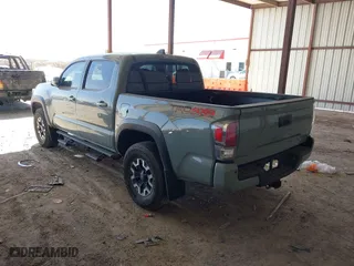 2023 Toyota Tacoma 4WD SR with VIN 3TMCZ5ANXPM613857, listed as a IAAI auction lot 41771957 with 76,232 mi miles. Bid and sale history available at carsss.com. Image 3.