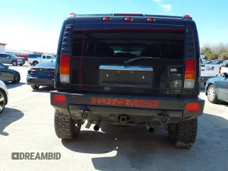 2004 Hummer H2 with VIN 5GRGN23U64H101592, listed as a IAAI auction lot 41379405 with 174,672 mi miles. Bid and sale history available at carsss.com. Image 16.