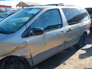 2003 Toyota Sienna LE with VIN 4T3ZF13C03U524122, listed as a IAAI auction lot 41655361 with 216,256 mi miles. Bid and sale history available at carsss.com. Image 17.