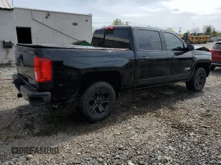 2018 Chevrolet Silverado 1500 LTZ with VIN 3GCUKSEC3JG247598, listed as a Copart auction lot 54361315 with 61,339 mi miles and Salvage Title. Bid and sale history available at DreamBid. Image 3.