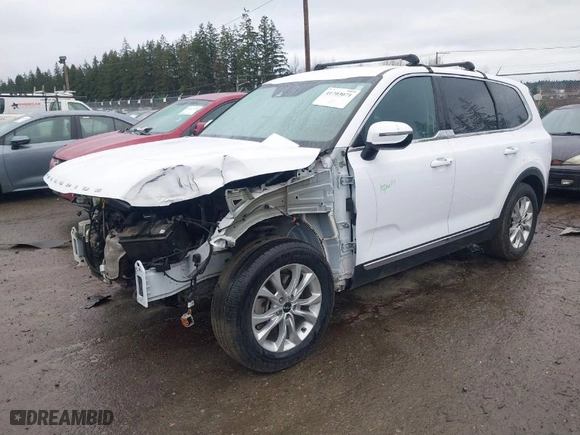 2022 Kia Telluride LX with VIN 5XYP2DHC3NG199299, listed as a IAAI auction lot 41703071 with 83,523 mi miles. Bid and sale history available at carsss.com. Image 2.
