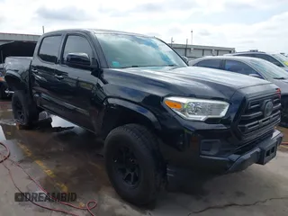 2018 Toyota Tacoma SR z VIN 5TFAX5GN6JX110350, wystawiony jako IAAI lot #42183817 z przebiegiem 77 232 mil mil oraz . Historia ofert i sprzedaży dostępna na DreamBid. Obrazek 1.