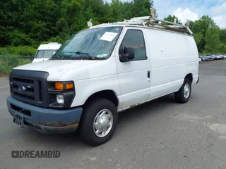2013 Ford Econoline Cargo Commercial with VIN 1FTNE2EL4DDA49674, listed as a IAAI auction lot 42660306 with 143,036 mi miles and . Bid and sale history available at DreamBid. Image 2.