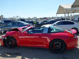 2016 Porsche 911 4S z VIN WP0BB2A99GS136573, wystawiony jako IAAI lot #42238845 z przebiegiem 13 464 mil mil oraz . Historia ofert i sprzedaży dostępna na DreamBid. Obrazek 14.