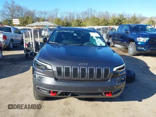 2022 Jeep Cherokee Trailhawk with VIN 1C4PJMBX9ND522235, listed as a IAAI auction lot 41738257 with 24,911 mi miles and . Bid and sale history available at DreamBid. Image 13.