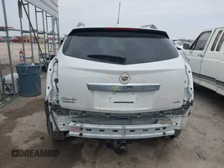 2015 Cadillac SRX Luxury Collection z VIN 3GYFNBE31FS552323, wystawiony jako IAAI lot #41553081 z przebiegiem 91 214 mil mil oraz . Historia ofert i sprzedaży dostępna na DreamBid. Obrazek 16.