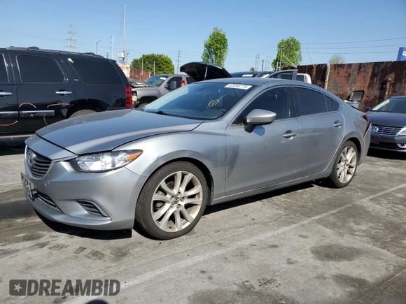 2014 Mazda Mazda6 i Touring with VIN JM1GJ1T68E1145743, listed as a Copart auction lot 52058775 with 324,652 mi miles and Salvage Title. Bid and sale history available at carsss.com. Image 1.