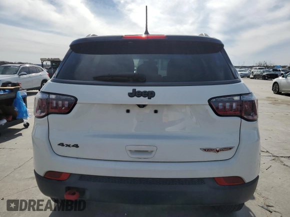2020 Jeep Compass Trailhawk with VIN 3C4NJDDB3LT189398, listed as a Copart auction lot 88671285 with 75,672 mi miles and Salvage title. Bid and sale history available at DreamBid. Image 6.