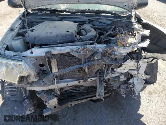 2015 Toyota Tacoma z VIN 3TMLU4EN3FM194963, wystawiony jako Copart lot #54074415 z przebiegiem 170 864 mil mil oraz Szkoda całkowita • Salvage title. Historia ofert i sprzedaży dostępna na DreamBid. Obrazek 11.