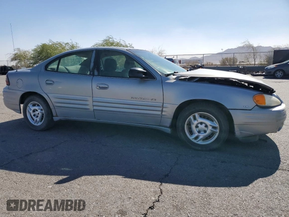 1999 Pontiac Grand Am SE2 with VIN 1G2NE52E5XM826878, listed as a Copart auction lot 77351164 with 241,463 mi miles and Salvage Title. Bid and sale history available at carsss.com. Image 4.