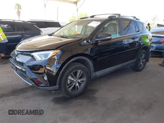 2018 Toyota RAV4 XLE with VIN 2T3WFREV2JW502622, listed as a IAAI auction lot 42327598 with 94,997 mi miles and . Bid and sale history available at DreamBid. Image 17.
