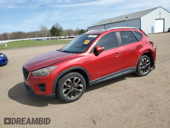 2016 Mazda CX-5 Grand Touring z VIN JM3KE2DY2G0705650, wystawiony jako Copart lot #53808365 z przebiegiem 123 611 mil mil oraz Szkoda całkowita • Salvage title. Historia ofert i sprzedaży dostępna na DreamBid. Obrazek 1.