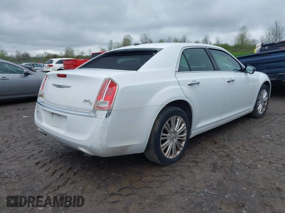 2014 Chrysler 300 C with VIN 2C3CCAKG5EH200996, listed as a IAAI auction lot 42201747 with 156,121 mi miles and . Bid and sale history available at carsss.com. Image 4.