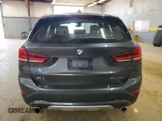 2021 BMW X1 xDrive28i with VIN WBXJG9C00M5S35249, listed as a Copart auction lot 61895775 with 34,641 mi miles and Salvage title. Bid and sale history available at DreamBid. Image 6.