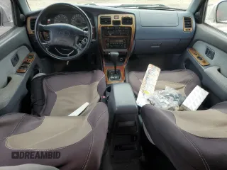 2000 Toyota 4Runner SR5 z VIN JT3GN86R6Y0145225, wystawiony jako Copart lot #58648785 z przebiegiem 162 374 mil mil oraz Czysty tytuł • Clean title. Historia ofert i sprzedaży dostępna na DreamBid. Obrazek 8.