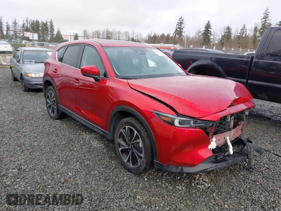 2023 Mazda CX-5 2.5 S Premium Package with VIN JM3KFBDM1P0161605, listed as a IAAI auction lot 41626777 with 26,581 mi miles. Bid and sale history available at carsss.com. Image 1.