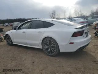 2016 Audi A7 3.0 Prestige with VIN WAU2GAFC9GN052829, listed as a Copart auction lot 39711603 with 103,284 mi miles. Bid and sale history available at carsss.com. Image 2.