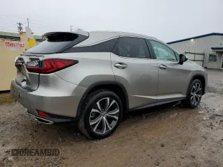 2022 Lexus RX with VIN 2T2HZMDA4NC321485, listed as a Copart auction lot 70409922 with 8,963 mi miles. Bid and sale history available at carsss.com. Image 3.