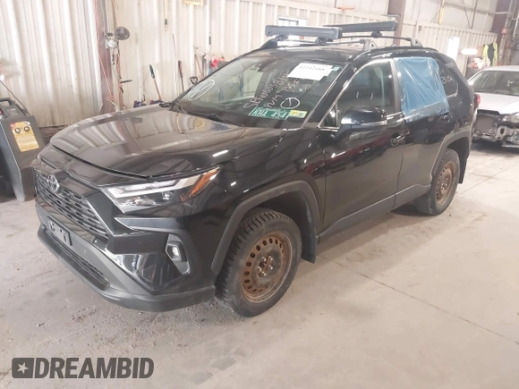 2022 Toyota RAV4 XLE Premium z VIN 2T3A1RFV1NW311285, wystawiony jako IAAI lot #42242488 z przebiegiem 51 678 mil mil oraz . Historia ofert i sprzedaży dostępna na DreamBid. Obrazek 17.