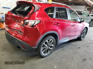 2016 Mazda CX-5 Grand Touring with VIN JM3KE4DY1G0669316, listed as a Copart auction lot 79961554 with 117,454 mi miles and Salvage Title. Bid and sale history available at carsss.com. Image 3.