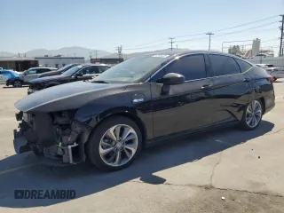 2019 Honda Clarity z VIN JHMZC5F18KC002672, wystawiony jako Copart lot #54206325 z przebiegiem 138 393 mil mil oraz Szkoda całkowita • Salvage title. Historia ofert i sprzedaży dostępna na DreamBid. Obrazek 1.