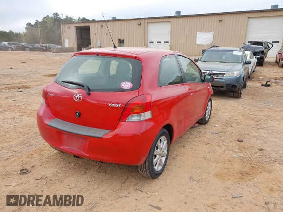 2009 Toyota Yaris with VIN JTDJT903595243068, listed as a IAAI auction lot 41899358 with 310,199 mi miles. Bid and sale history available at carsss.com. Image 4.