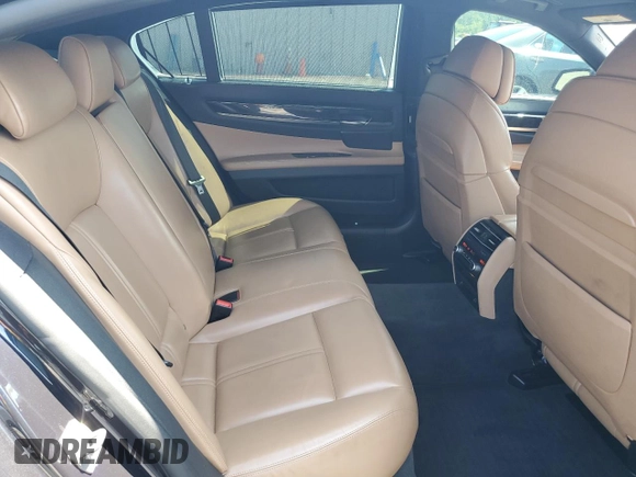 2012 BMW 7 Series 750Li с VIN WBAKB8C56CDX21023, выставлен на аукционе Copart как лот 61988955 с пробегом 145 022 миль миль и Списание • Salvage title. История ставок и продаж доступна на DreamBid. Изображение 10.