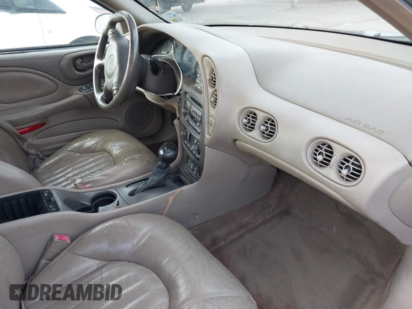 2002 Pontiac Bonneville SLE z VIN 1G2HY54K324126583, wystawiony jako IAAI lot #41939075 z przebiegiem 178 591 mil mil oraz . Historia ofert i sprzedaży dostępna na DreamBid. Obrazek 5.